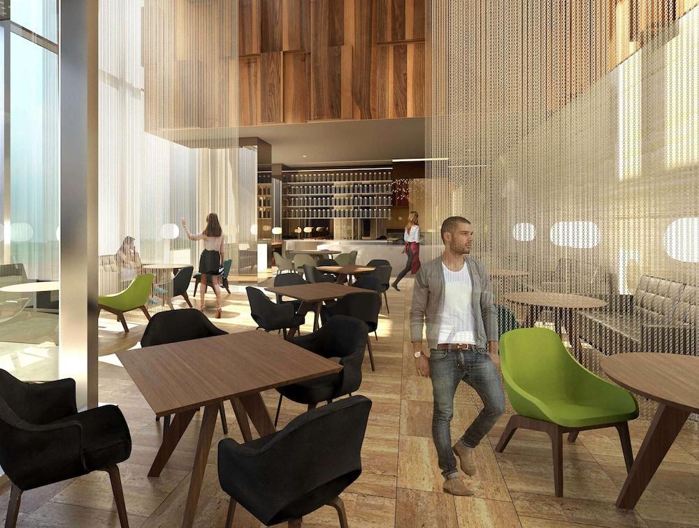 Aleph Doha Residences, Curio Collection By Hilton Экстерьер фото The interior of the new restaurant