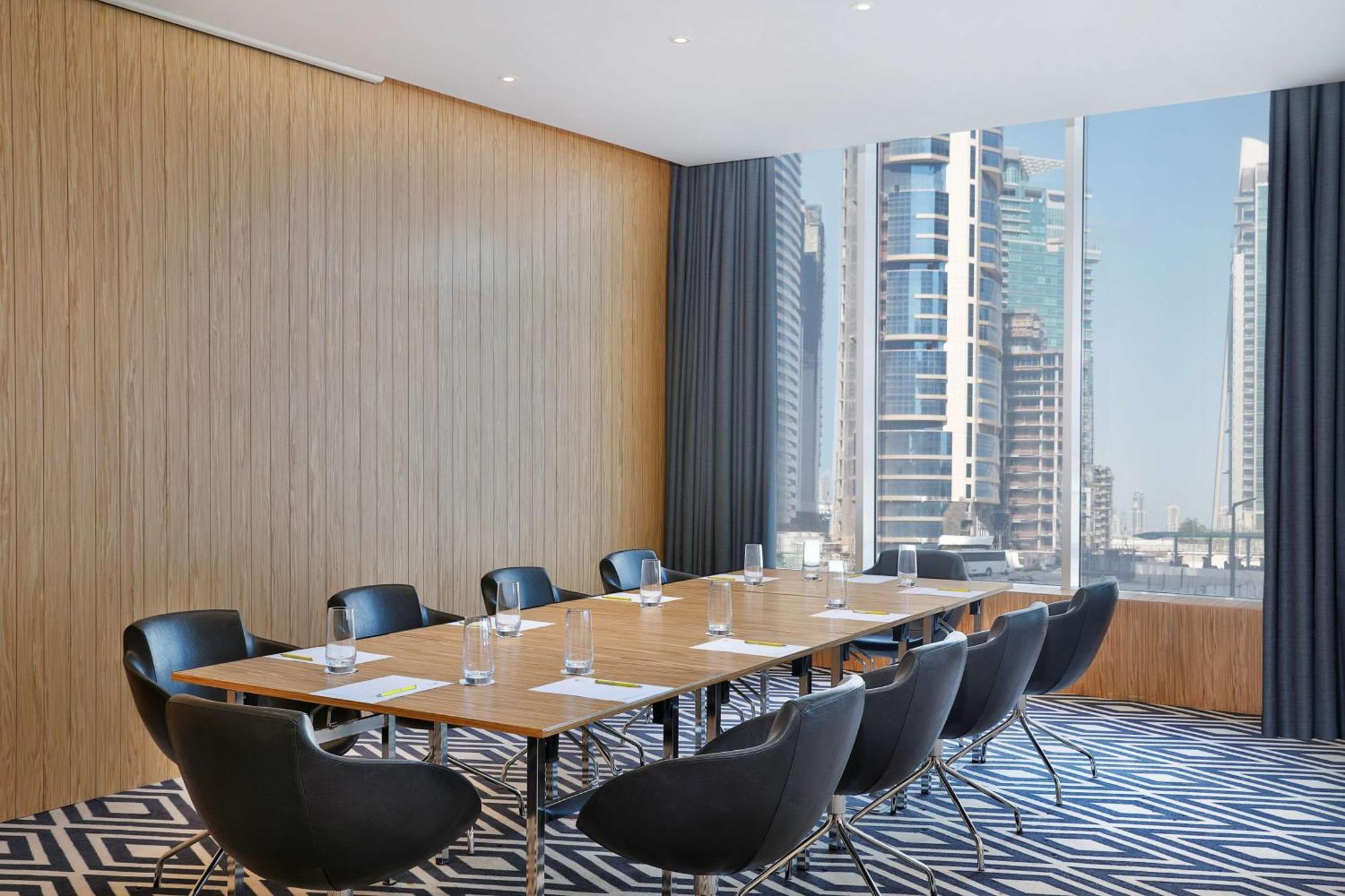 Aleph Doha Residences, Curio Collection By Hilton Экстерьер фото Meeting room