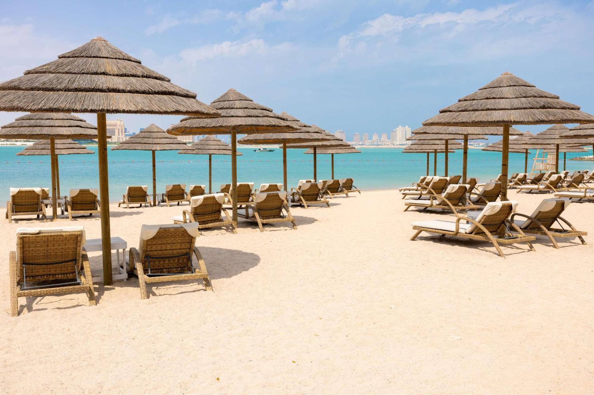 Aleph Doha Residences, Curio Collection By Hilton Экстерьер фото Beach at Jumeirah Islands